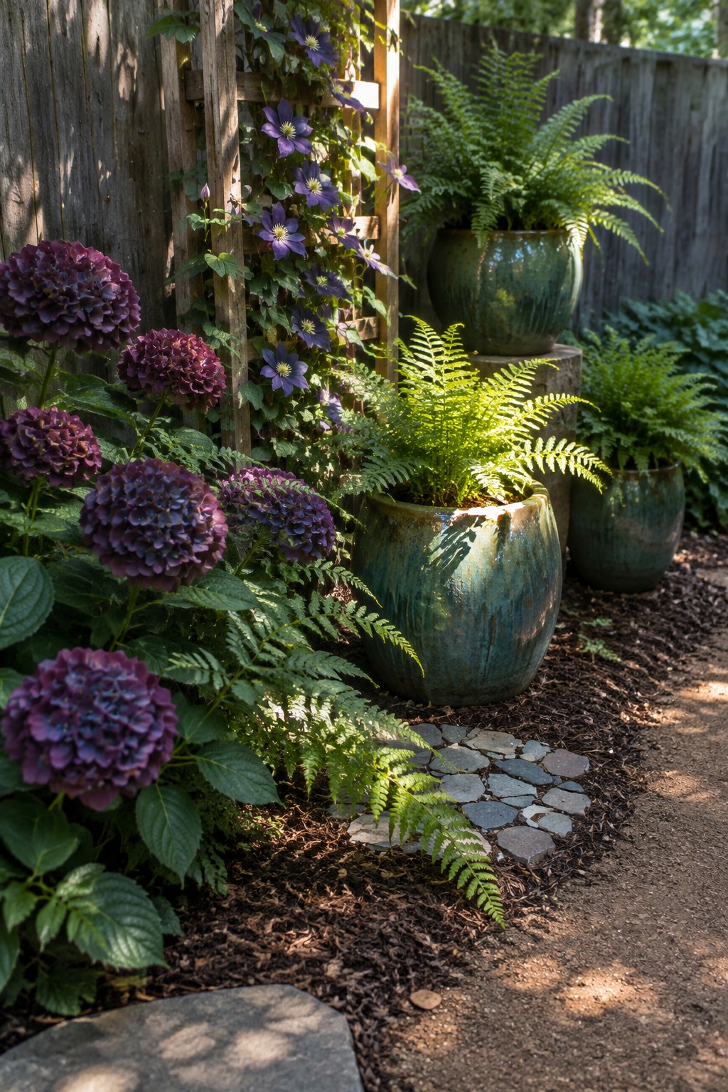 Purple clematis climbs a wooden trellis among hydrangeas and ferns, with ferns growing in large green ceramic pots beside a stone path.